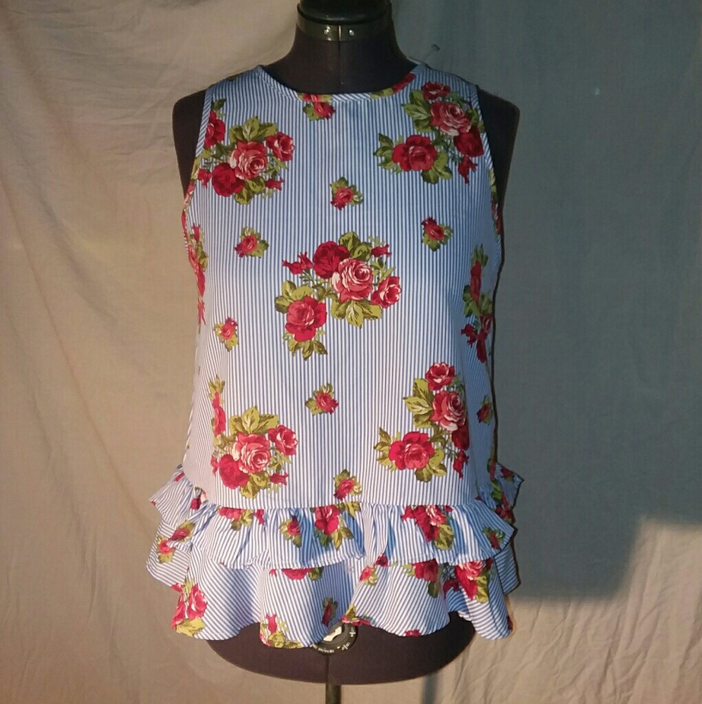 Petit gateau ruffle bottom sleeveless blouse